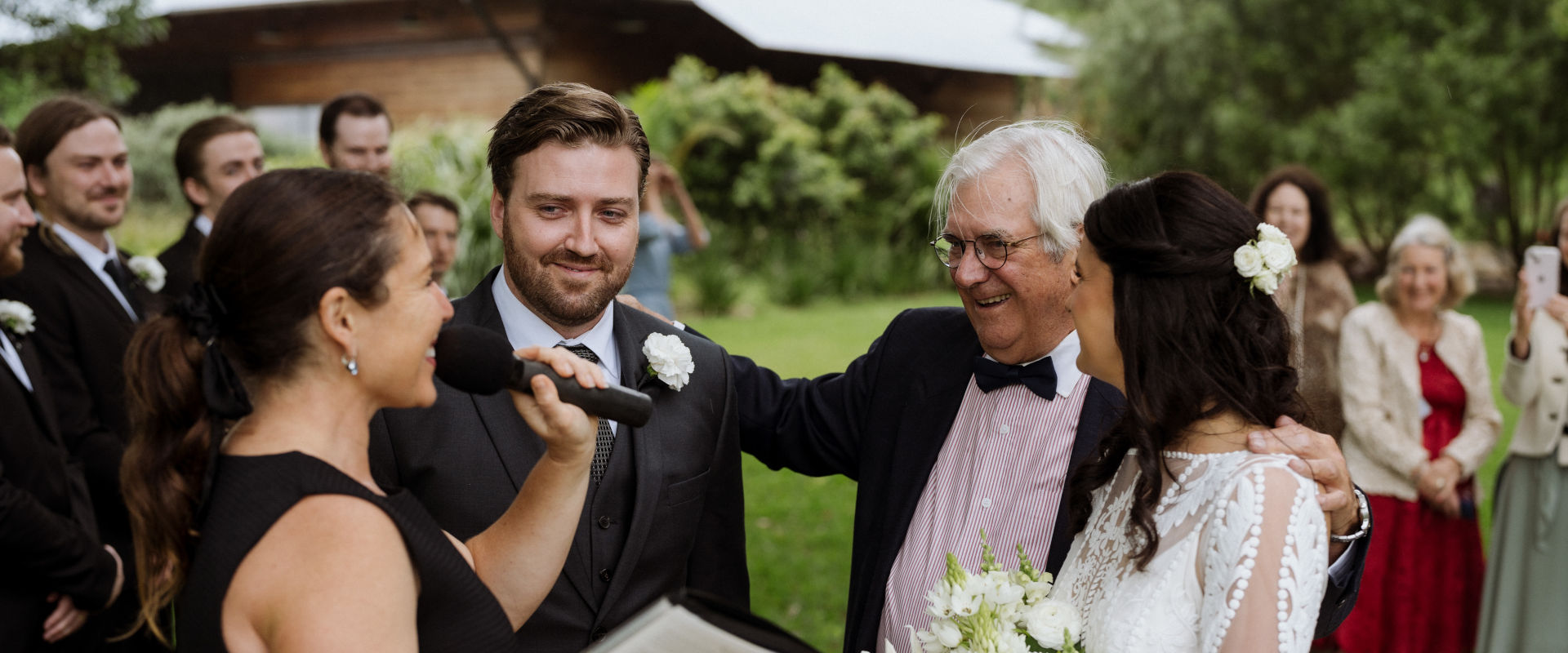 Couple getting married - wedding ceremony officiated by Chiquita Mitchell