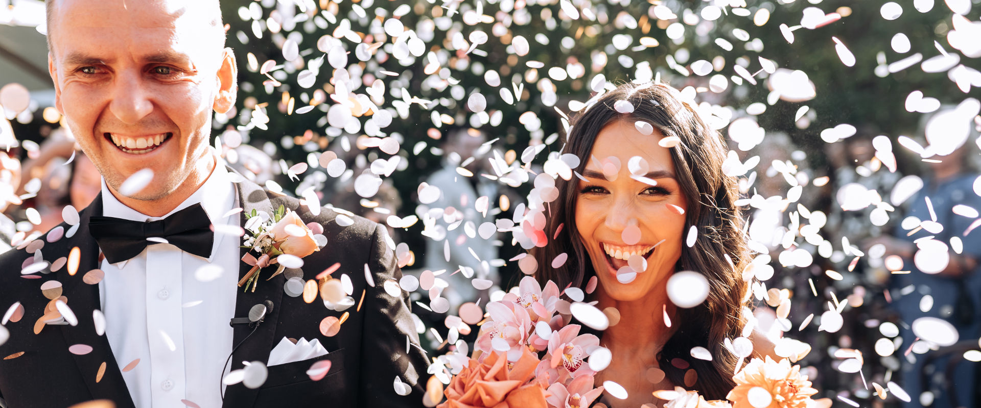 Wedding couple and confetti - married by Chiquita Mitchell